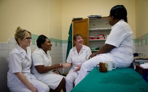 Midwives Ester Mongi and Juliana Msoffe meet Cheryl and Delia at Kiomboi hospital, Tanzania.
